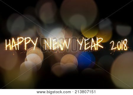 Happy New Year Sprkler Light On Aabstract Bokeh Background.