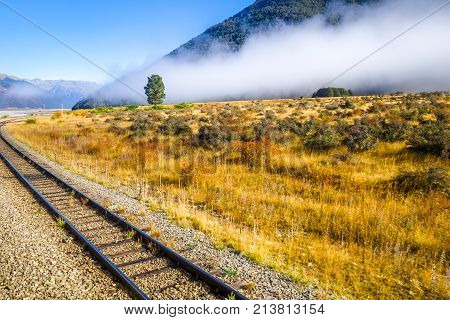 Railway in Mountain fields landscape New Zealand alps