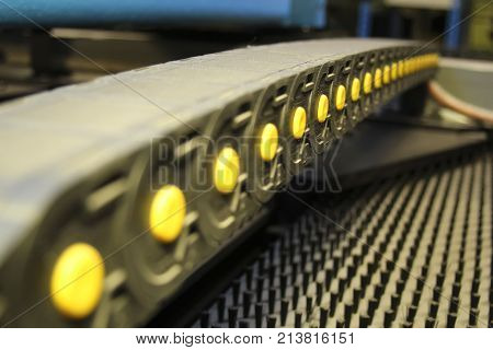 Abstract industrial background in perspective. conveyor belt and working surface of CNC machine