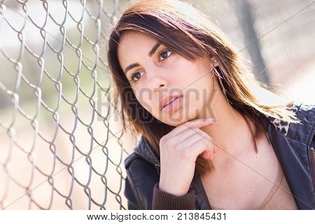 Beautiful Meloncholy Mixed Race Young Woman Portrait Outside.