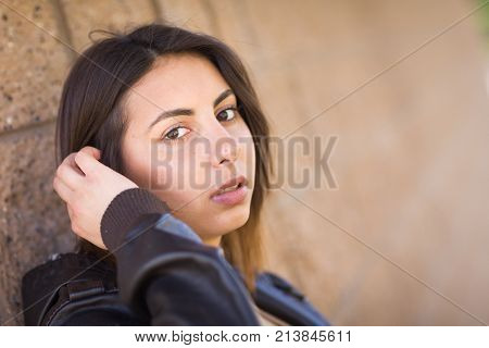 Beautiful Meloncholy Mixed Race Young Woman Portrait Outside.