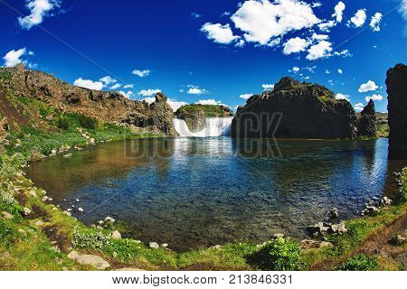famous Hjalparfoss waterfall in southern Iceland. treking in Iceland. Travel and landscape photography concept