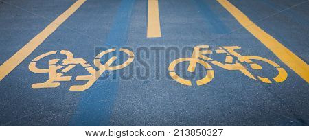 Bicycle Signs Painted On Asphalt