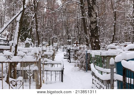 Old Red (Bugrovsky) cemetery in the Nizhny Novgorod at winter. Russia. The present cemetery was planned at the turn of the 1880s-90s. The actual formation occurred during the First World War.