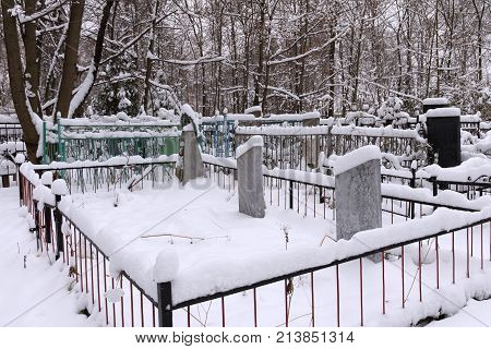 Old Red (Bugrovsky) cemetery in the Nizhny Novgorod at winter. Russia. The present cemetery was planned at the turn of the 1880s-90s. The actual formation occurred during the First World War.