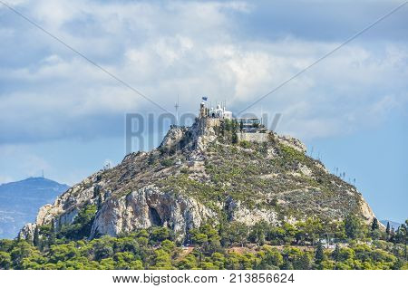 closeup of the Lycabettus hill from where you can appreciate the city of Athens