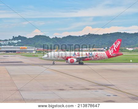 Penang, Malaysia - May 13, 2017: An Air Asia Airbus preparing for take-off from Penang International airport in Penang Island, Malaysia. Air Asia is a low-cost airline from Malaysia.