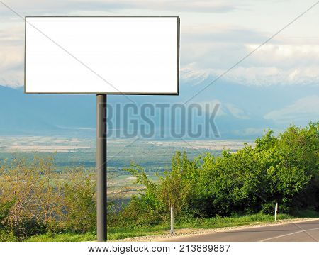 Horizontal blank billboard for outdoor advertising next to the road. Blank white mockup  poster.Template for advertising