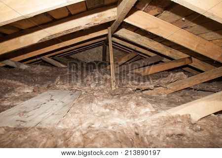 mineral wool in the attic of the house Foam plastic Insulation of a new home on a new roof