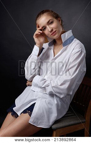 Young Pretty Woman In White Shirt