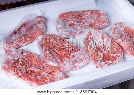 Frozen raw pork neck chops meat steak