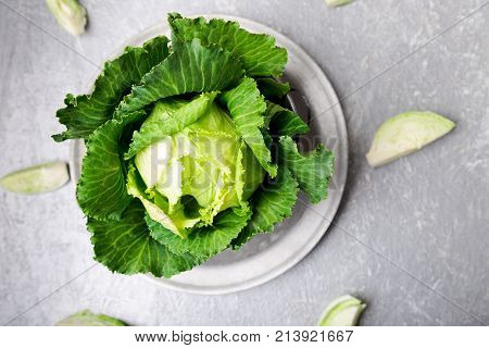 Fresh Green Cabbage In Metal Plate On Grey Background. Top View. Copy Space.