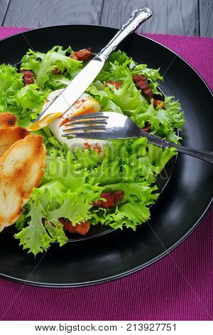 Frisee, Crispy Bacon And A Poached Egg Salad