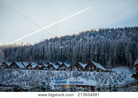 Bukovel, Ukraine - December 22, 2016: The wooden houses in the Ukrainian resort Bukovel at Bukovel, Ukraine on December 22, 2016