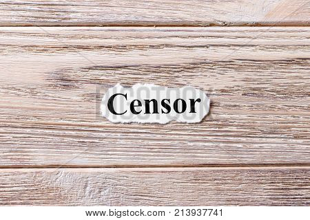 Censor of the word on paper. concept. Words of Censor on a wooden background.