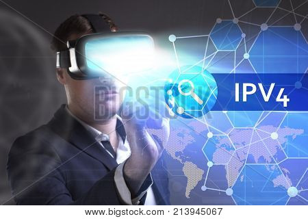 Business, Technology, Internet And Network Concept. Young Businessman Working In Virtual Reality Gla