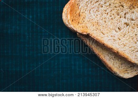 On Wooden Background, On The Boards Of Toasted Bread