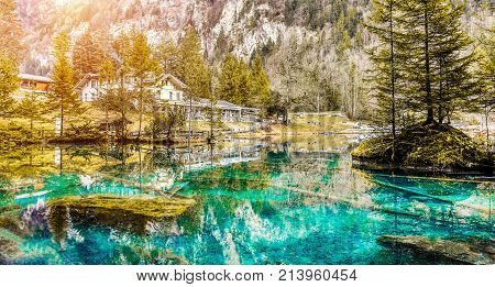 BLAUSEE KANDERGRUND SWITZERLAND - DECEMBER 18 2016:Blue Lake nature park in winter Kandersteg Switzerland.Paradise mountain landscape for tourist and traveler.