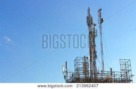 Three mobile phone communication tower transmission signal.