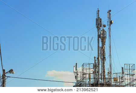 Three mobile phone communication tower transmission signal.