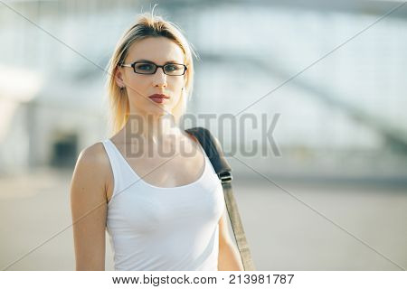 Portrait of a business woman in black glasses