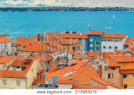PIRAN SLOVENIA - SEPTEMBER 3 2017: Piran rooftops on sunny summer day. Piran is the administrative centre of Slovenian Istria and one of Slovenia's major tourist attractions.