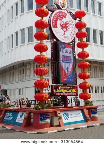 Malacca, Malaysia--february 2018: Red Lantern Adorn An Intersection To Jonker Street, One Of The Mos
