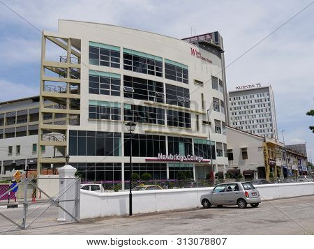 Malacca, Malaysia-- February 2018: Newbridge College With A Car Parked Outside In Malacca City.