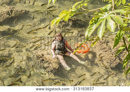 Tourist Swimming With The Fishes. Woman Swimming At The Transparent Water Of A River Of Bonito Ms, B