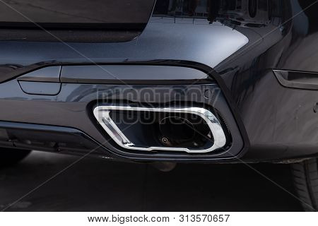 Novosibirsk, Russia - 07.20.2019: Black New Bmw X7 Xdrive40i 2019 Year Rear Exhaust Pipe View With L