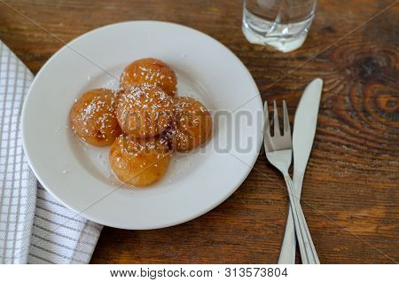 Kemalpasa Dessert Ready To Eat  On The Wooden Table. Isolated, Object.