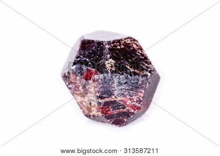 Macro Of A Mineral Garnet Stone On A White Background