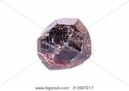 Macro Of A Mineral Garnet Stone On A White Background