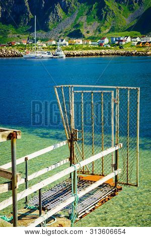 Fishing Port Old Pier And Gate With Bleik Village Houses In The Background. Andoya Island, Vesterale