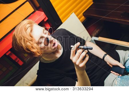 Smoker Smoking Hybrid Smokeless Cigarette Device That Uses Real Tobacco Refills, A Hybrid Technology