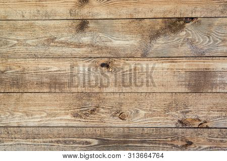 Old Brown Wood Background Made Of Dark Natural Wood In Grunge Style. The View From The Top. Natural 