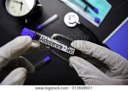 Aldosterone - Test With Blood Sample. Top View Isolated On Black Background. Healthcare/medical Conc