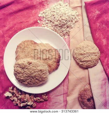 Homemade Oatmeal Cookies On A White Plate, Children Love This Very Much.