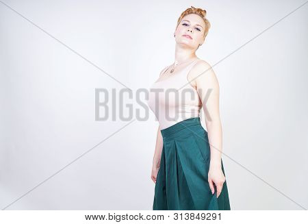 Pin Up Curvy Girl In Green Pleated Midi Skirt On White