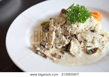 Chicken Scallopini White Sauce In Close Up