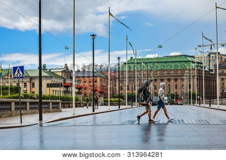 Stockholm, Sweden - July 1, 2019: View Of Norrbro Bridge From The Royal Palace In Rainy Day, Connect