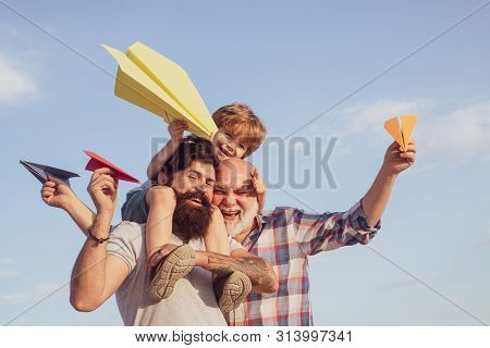 Three Different Generations Ages: Grandfather Father And Child Son Together. Father And Son Enjoying