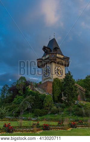 The Famous Clock Tower (grazer Uhrturm) And Gardens On Shlossberg Hill, Graz, Styria Region, Austria