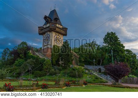 The Famous Clock Tower (grazer Uhrturm) And Gardens On Shlossberg Hill, Graz, Styria Region, Austria