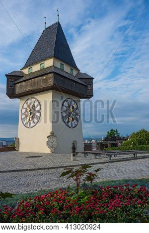 The Famous Clock Tower (grazer Uhrturm) And Gardens On Shlossberg Hill, Graz, Styria Region, Austria
