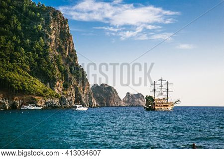 Vintage pirate ship on Cleopatra's beach  on suny day Alanya. Turkey.