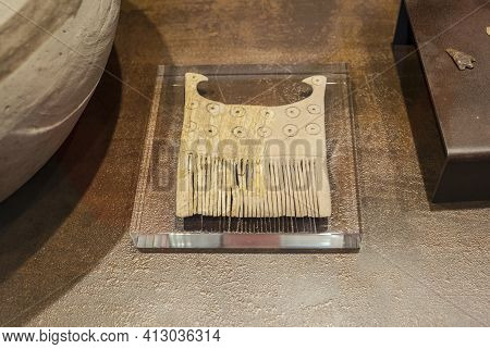 Lisbon, Portugal - March The 1st, 2020: Ivory Comb Of Tell Abraq. 2300 Bc. National Archaeology Muse