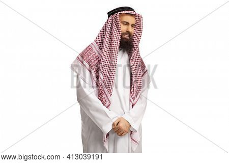 Young saudi arab man in a traditional dishdasha looking to the side isolated on white background
