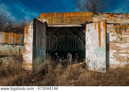 Entrance To Abandoned Underground Depot In Soviet Military Base