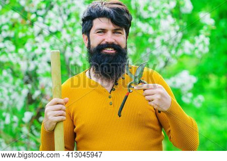 Smiling Man With Garden Scissors. Gardening Work In Spring Time.